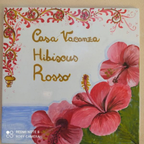 Отель Hibiscus Rosso  Донналуката
